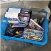 Image 1 : Bin of various game pads and accessories