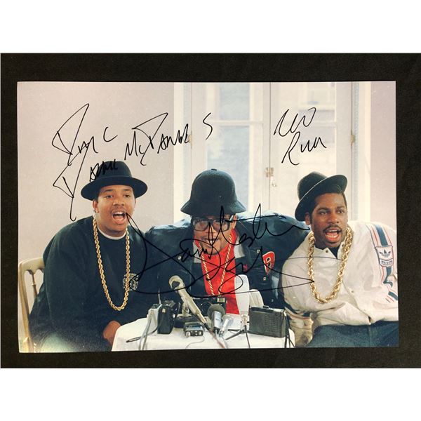 RUN DMC BAND SIGNED 8 X 10 ( RA COA)