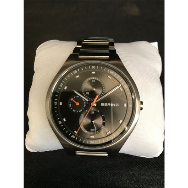 BRAND NEW MADE IN DEMARK  BERING TITANIUM MENS WRIST WATCH WITH BOX AND PAPERS