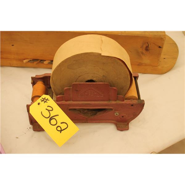 4P CAST IRON ROLLER W/ROLL OF PAPER