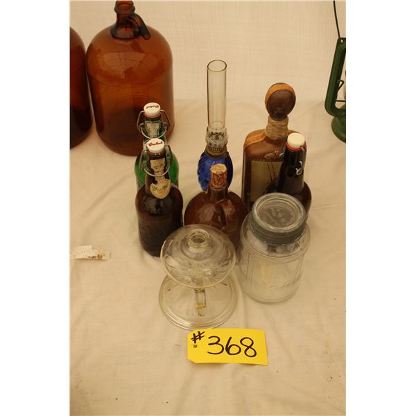 1 - LEATHER LIQUOR  BOTTLE MADE IN ITALY,3 - GROLSCH LIQUOR BOTTLES, 1 - BLUE LAMP,1 - CLEAR FINGER 