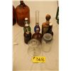 Image 1 : 1 - LEATHER LIQUOR  BOTTLE MADE IN ITALY,3 - GROLSCH LIQUOR BOTTLES, 1 - BLUE LAMP,1 - CLEAR FINGER 