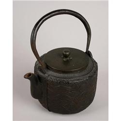 ASIAN TETSUBIN TEAPOT WITH WAVE DESIGN