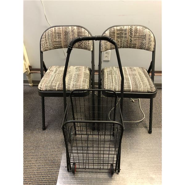 Two folding cushioned chairs & a foldup black metal grocery cart