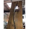 Image 2 : Large wooden sculpture on solid steel plate - approx. 7ft tall x 2ft wide from the show