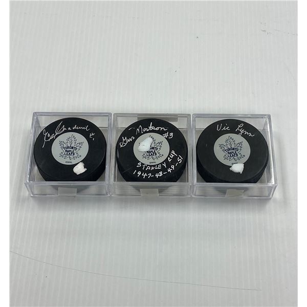Three Signed Hockey Pucks w/COA (Ed Chadwick, Gus Mortson, Vic Lynn)
