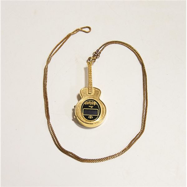 VINTAGE ELECTRONIC WATCH / GUITAR PENDANT WITH A