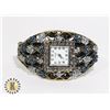 Image 1 : LARGE RHINESTONE FLORAL CLAMPER WATCH