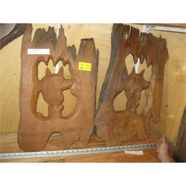 2 CARVINGS OF THE WOLVES