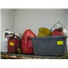 Image 1 : SHELF OF ASST. OIL FUNNELS, GAS CANS, BRAKE CLEANER, ETC.