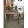 Image 1 : SINGER HEAVY DUTY TREADLE SEWING MACHINE WITH BAG OF ACCESS.