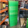 Image 1 : STACK OF 21 GREEN STORAGE TOTES RANGE FROM GOOD TO POOR