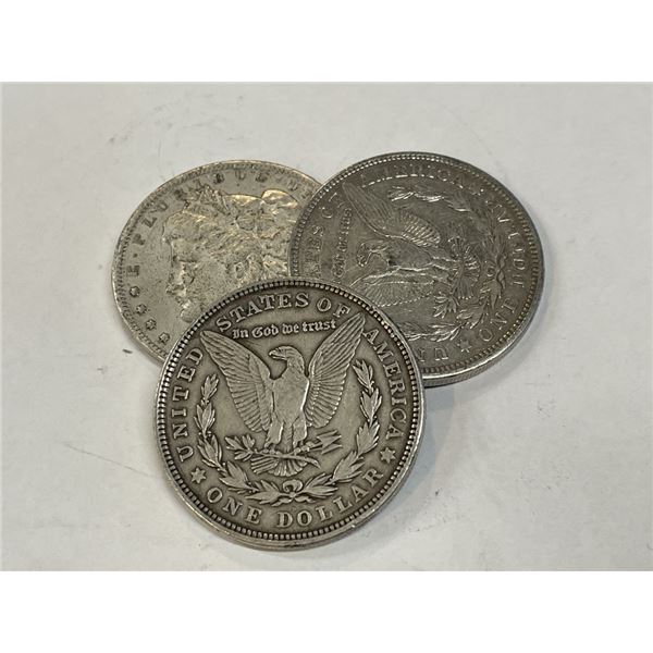 (3) Morgan Silver Dollars