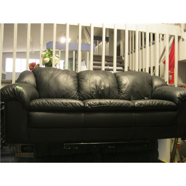 Leather looking Couch nice condition