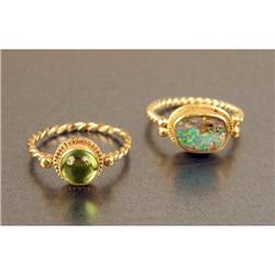 TWO UNMARKED YELLOW GOLD RINGS