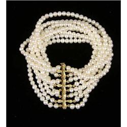 A NINE-STRAND PEARL BRACELET