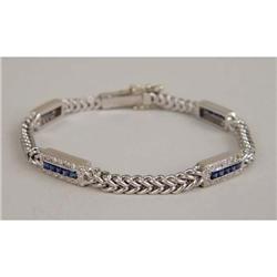 A 14K WHITE GOLD DIAMOND AND SAPPHIRE CHAIN LINK AND PLAQUE BRACELET