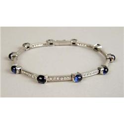AN ITALIAN 18K WHITE GOLD DIAMOND AND CABOCHON SAPPHIRE LINK BRACELET