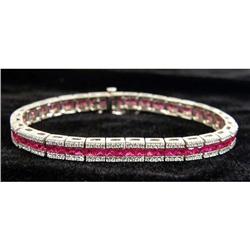 A 14K WHITE GOLD DIAMOND AND RUBY LINK BRACELET