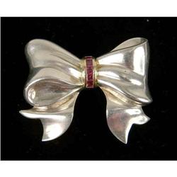 A TIFFANY &amp; CO STERLING SILVER, 14KT YELLOW GOLD AND TOURMALINE BOW BROOCH