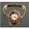 Image 1 : A 14K YELLOW GOLD, DIAMOND AND RUBY WATCH CASE