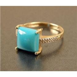 A 14K YELLOW GOLD AND TURQUOISE RING