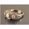 Image 1 : A 14K WHITE GOLD AND DIAMOND THREE-STONE RING