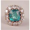 Image 1 : AN UNMARKED YELLOW GOLD, DIAMOND AND EMERALD RING