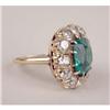 Image 2 : AN UNMARKED YELLOW GOLD, DIAMOND AND EMERALD RING