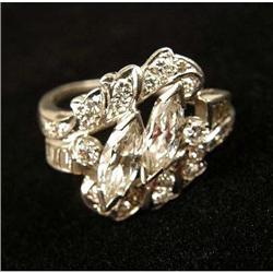 A PLATINUM AND DIAMOND COCKTAIL RING