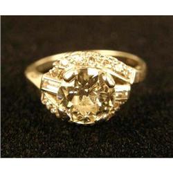 A 14K YELLOW GOLD AND DIAMOND RING