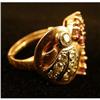 Image 2 : AN UNMARKED ROSE GOLD DIAMOND AND RUBY RING