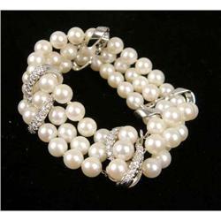 A14K WHITE GOLD, PEARL AND DIAMOND THREE-STRAND BRACELET
