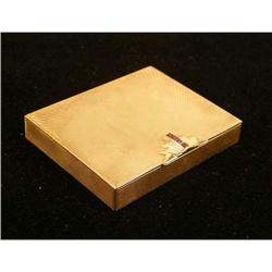 A TIFFANY 14K YELLOW GOLD AND RUBY HINGED-LID COMPACT