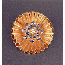 A 14K YELLOW GOLD, DIAMOND AND SAPPHIRE FLOWER-FORM BROOCH