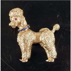 A TIFFANY &amp; CO. 14K YELLOW GOLD, SAPPHIRE AND RUBY POODLE-FORM PIN