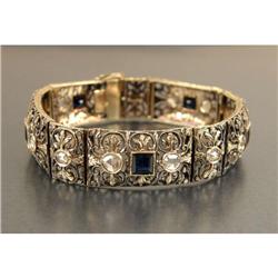 A YELLOW GOLD WITH SILVER-TOPPED SAPPHIRE AND DIAMOND BRACELET