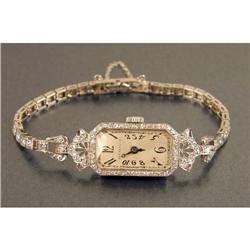 A TIFFANY PLATINUM AND DIAMOND BRACELET WRISTWATCH