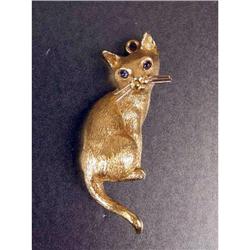 A TIFFANY 18K YELLOW GOLD CAT-FORM PENDANT