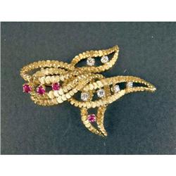A FRENCH 18K YELLOW GOLD, DIAMOND AND RUBY FREE-FORM BROOCH
