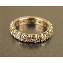 A PLATINUM AND DIAMOND ETERNITY BAND