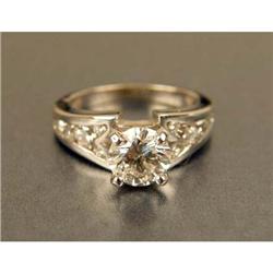 A 14K WHITE GOLD AND DIAMOND RING