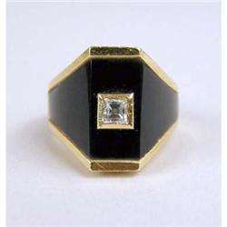 AN 18K YELLOW GOLD, ONYX AND DIAMOND RING
