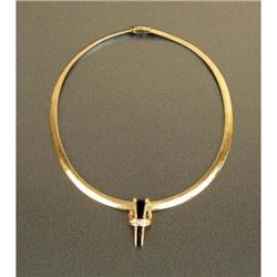 AN ITALIAN 14K YELLOW GOLD REVERSING TO 14K WHITE GOLD SNAKE CHAIN WITH 14K YELLOW GOLD DIAMOND AND 