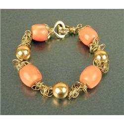 AN 18K YELLOW GOLD RARE SICILIAN CORAL AND DIAMOND BRACELET