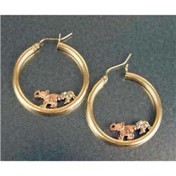 A PAIR OF YELLOW GOLD HOOP EARRINGS