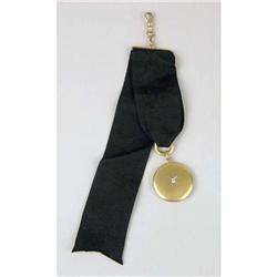 A 14K YELLOW GOLD AND DIAMOND WATCH FOB