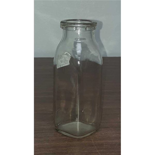 Vintage glass cream bottle