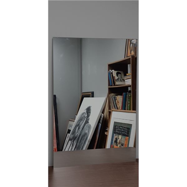 MIRROR 22" X 32" HAS SMALL CHIP IN CORNER