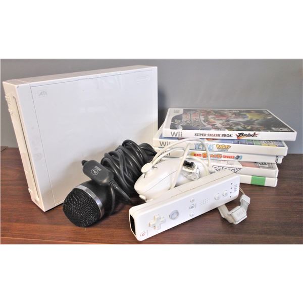 Wii Gaming System - 1 Nunchuck and Joy Stick, 4 Microphones, and FIVE Games